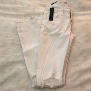 Joe’s ripped white jeans. New with tags!